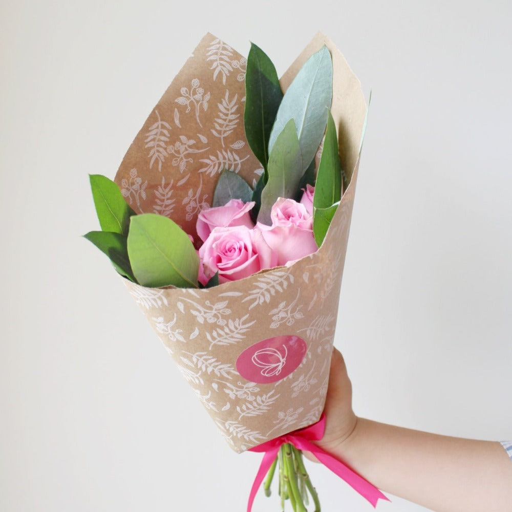 Rosas rojas o rosadas